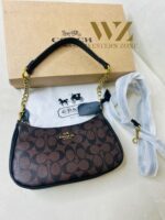 COACH  6603 𝐏𝐫𝐞𝐦𝐢𝐮𝐦 𝐋𝐚𝐝𝐢𝐞𝐬 𝐁𝐚𝐠 ⚡️  ✨ 𝐄𝐥𝐞𝐯𝐚𝐭𝐞 𝐲𝐨𝐮𝐫 𝐬𝐭𝐲𝐥𝐞 𝐰𝐢𝐭𝐡 𝐨𝐮𝐫 𝐏𝐫𝐞𝐦𝐢𝐮𝐦 𝐋𝐚𝐝𝐢𝐞𝐬 𝐁𝐚𝐠𝐬! 💫𝐂𝐫𝐚𝐟𝐭𝐞𝐝 𝐰𝐢𝐭𝐡 𝐞𝐥𝐞𝐠𝐚𝐧𝐜𝐞 𝐚𝐧𝐝 𝐝𝐞𝐬𝐢𝐠𝐧𝐞𝐝 𝐟𝐨𝐫 𝐭𝐡𝐞 𝐦𝐨𝐝𝐞𝐫𝐧 𝐰𝐨𝐦𝐚𝐧, 𝐭𝐡𝐞𝐬𝐞 𝐛𝐚𝐠𝐬 𝐚𝐫𝐞 𝐭𝐡𝐞 𝐩𝐞𝐫𝐟𝐞𝐜𝐭 𝐛𝐥𝐞𝐧𝐝 𝐨𝐟 𝐥𝐮𝐱𝐮𝐫𝐲 𝐚𝐧𝐝 𝐟𝐮𝐧𝐜𝐭𝐢𝐨𝐧𝐚𝐥𝐢𝐭𝐲. 𝐂𝐚𝐫𝐫𝐲 𝐲𝐨𝐮𝐫 𝐞𝐬𝐬𝐞𝐧𝐭𝐢𝐚𝐥𝐬 𝐢𝐧 𝐬𝐭𝐲𝐥𝐞 𝐰𝐡𝐞𝐫𝐞𝐯𝐞𝐫 𝐲𝐨𝐮 𝐠𝐨! 🌟  * Imported products. * Quality Controlled (QC )Finishing. * Very Own Unique Design. - Image 9