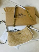COACH  6603 𝐏𝐫𝐞𝐦𝐢𝐮𝐦 𝐋𝐚𝐝𝐢𝐞𝐬 𝐁𝐚𝐠 ⚡️  ✨ 𝐄𝐥𝐞𝐯𝐚𝐭𝐞 𝐲𝐨𝐮𝐫 𝐬𝐭𝐲𝐥𝐞 𝐰𝐢𝐭𝐡 𝐨𝐮𝐫 𝐏𝐫𝐞𝐦𝐢𝐮𝐦 𝐋𝐚𝐝𝐢𝐞𝐬 𝐁𝐚𝐠𝐬! 💫𝐂𝐫𝐚𝐟𝐭𝐞𝐝 𝐰𝐢𝐭𝐡 𝐞𝐥𝐞𝐠𝐚𝐧𝐜𝐞 𝐚𝐧𝐝 𝐝𝐞𝐬𝐢𝐠𝐧𝐞𝐝 𝐟𝐨𝐫 𝐭𝐡𝐞 𝐦𝐨𝐝𝐞𝐫𝐧 𝐰𝐨𝐦𝐚𝐧, 𝐭𝐡𝐞𝐬𝐞 𝐛𝐚𝐠𝐬 𝐚𝐫𝐞 𝐭𝐡𝐞 𝐩𝐞𝐫𝐟𝐞𝐜𝐭 𝐛𝐥𝐞𝐧𝐝 𝐨𝐟 𝐥𝐮𝐱𝐮𝐫𝐲 𝐚𝐧𝐝 𝐟𝐮𝐧𝐜𝐭𝐢𝐨𝐧𝐚𝐥𝐢𝐭𝐲. 𝐂𝐚𝐫𝐫𝐲 𝐲𝐨𝐮𝐫 𝐞𝐬𝐬𝐞𝐧𝐭𝐢𝐚𝐥𝐬 𝐢𝐧 𝐬𝐭𝐲𝐥𝐞 𝐰𝐡𝐞𝐫𝐞𝐯𝐞𝐫 𝐲𝐨𝐮 𝐠𝐨! 🌟  * Imported products. * Quality Controlled (QC )Finishing. * Very Own Unique Design. - Image 3