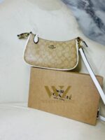 COACH  6603 𝐏𝐫𝐞𝐦𝐢𝐮𝐦 𝐋𝐚𝐝𝐢𝐞𝐬 𝐁𝐚𝐠 ⚡️  ✨ 𝐄𝐥𝐞𝐯𝐚𝐭𝐞 𝐲𝐨𝐮𝐫 𝐬𝐭𝐲𝐥𝐞 𝐰𝐢𝐭𝐡 𝐨𝐮𝐫 𝐏𝐫𝐞𝐦𝐢𝐮𝐦 𝐋𝐚𝐝𝐢𝐞𝐬 𝐁𝐚𝐠𝐬! 💫𝐂𝐫𝐚𝐟𝐭𝐞𝐝 𝐰𝐢𝐭𝐡 𝐞𝐥𝐞𝐠𝐚𝐧𝐜𝐞 𝐚𝐧𝐝 𝐝𝐞𝐬𝐢𝐠𝐧𝐞𝐝 𝐟𝐨𝐫 𝐭𝐡𝐞 𝐦𝐨𝐝𝐞𝐫𝐧 𝐰𝐨𝐦𝐚𝐧, 𝐭𝐡𝐞𝐬𝐞 𝐛𝐚𝐠𝐬 𝐚𝐫𝐞 𝐭𝐡𝐞 𝐩𝐞𝐫𝐟𝐞𝐜𝐭 𝐛𝐥𝐞𝐧𝐝 𝐨𝐟 𝐥𝐮𝐱𝐮𝐫𝐲 𝐚𝐧𝐝 𝐟𝐮𝐧𝐜𝐭𝐢𝐨𝐧𝐚𝐥𝐢𝐭𝐲. 𝐂𝐚𝐫𝐫𝐲 𝐲𝐨𝐮𝐫 𝐞𝐬𝐬𝐞𝐧𝐭𝐢𝐚𝐥𝐬 𝐢𝐧 𝐬𝐭𝐲𝐥𝐞 𝐰𝐡𝐞𝐫𝐞𝐯𝐞𝐫 𝐲𝐨𝐮 𝐠𝐨! 🌟  * Imported products. * Quality Controlled (QC )Finishing. * Very Own Unique Design. - Image 4